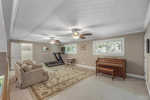 bedroom featuring a textured ceiling, a chandelier, connected bathroom, light hardwood / wood-style floors, and ornamental molding