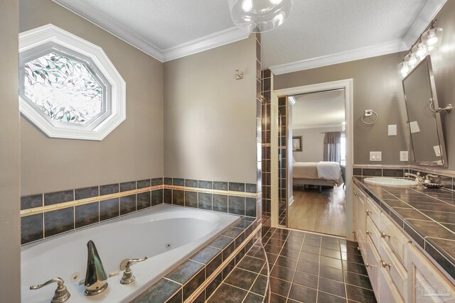 carpeted bedroom featuring a textured ceiling, ceiling fan, crown molding, ensuite bath, and sink