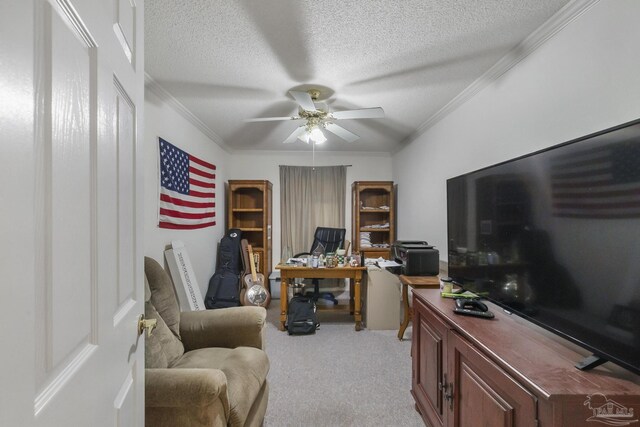 carpeted living room featuring a textured ceiling, ornamental molding, and ceiling fan