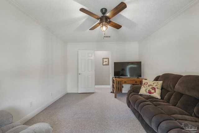 laundry room with crown molding, a textured ceiling, light tile patterned floors, cabinets, and independent washer and dryer