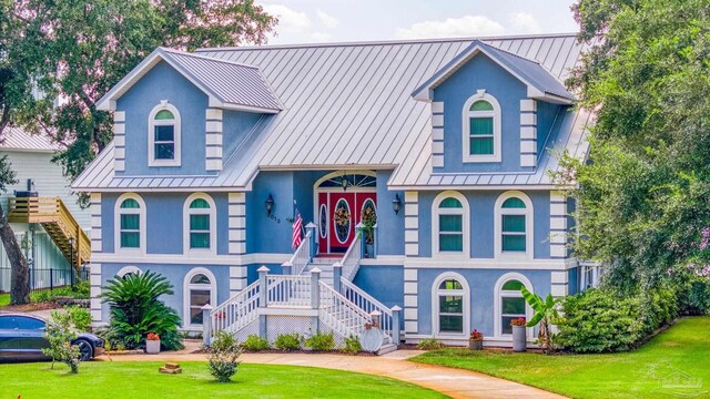 view of front facade with a front yard