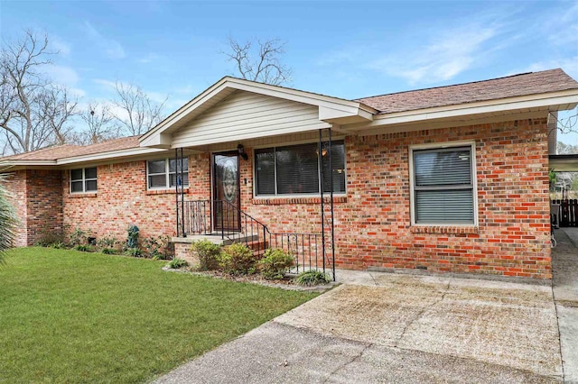 ranch-style house with a front yard