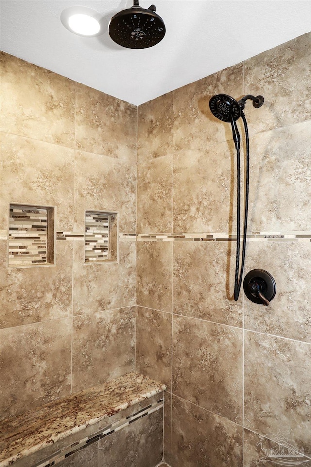 details featuring tiled shower