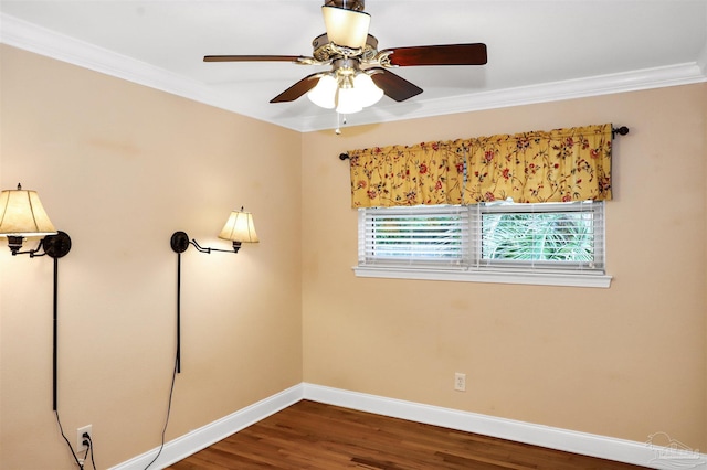 empty room featuring hardwood / wood-style flooring, ceiling fan, and ornamental molding