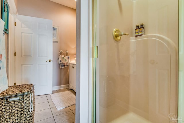 bathroom featuring walk in shower and tile patterned floors