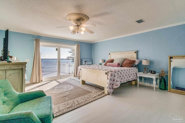 bedroom with ornamental molding, a textured ceiling, ceiling fan, and access to outside