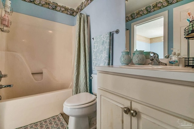 full bathroom featuring shower / bath combo, toilet, and vanity