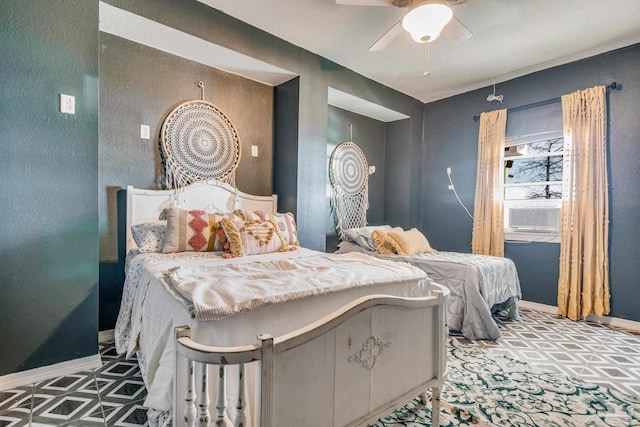 bedroom featuring ceiling fan and cooling unit