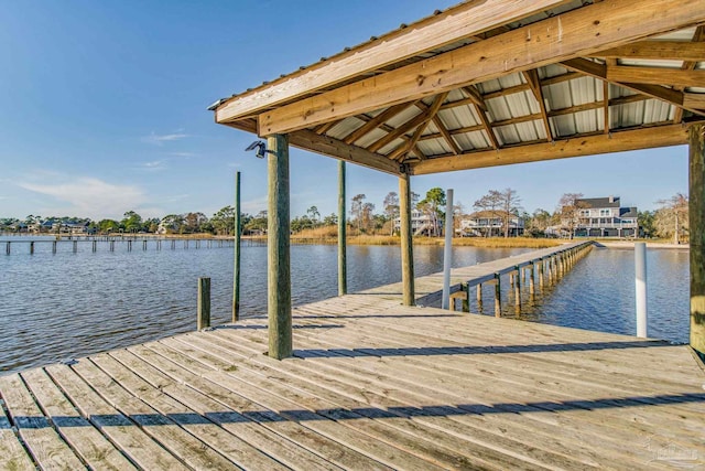 dock area with a water view