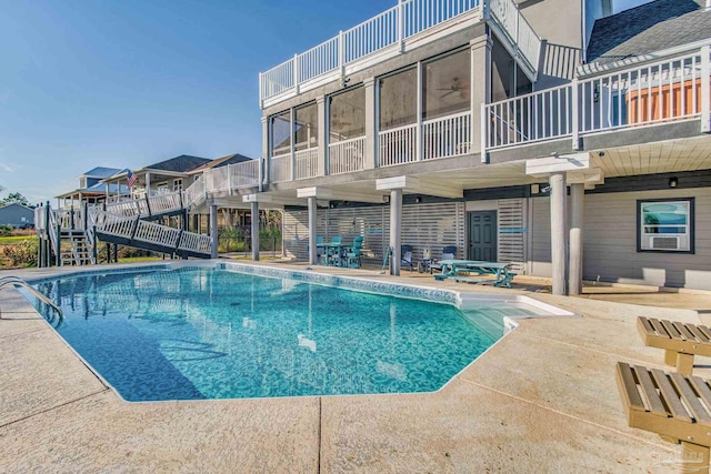 view of swimming pool featuring a patio