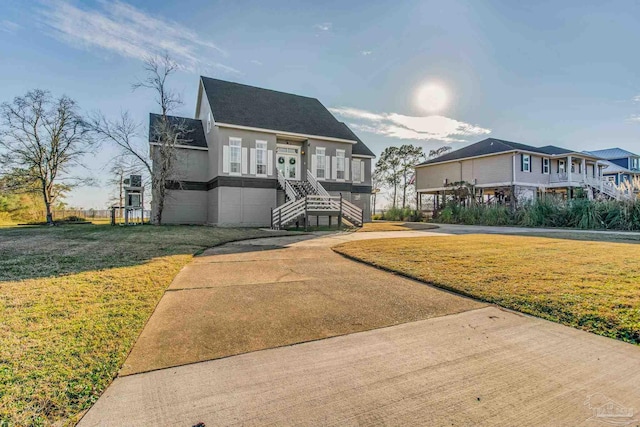 view of front of home with a front lawn