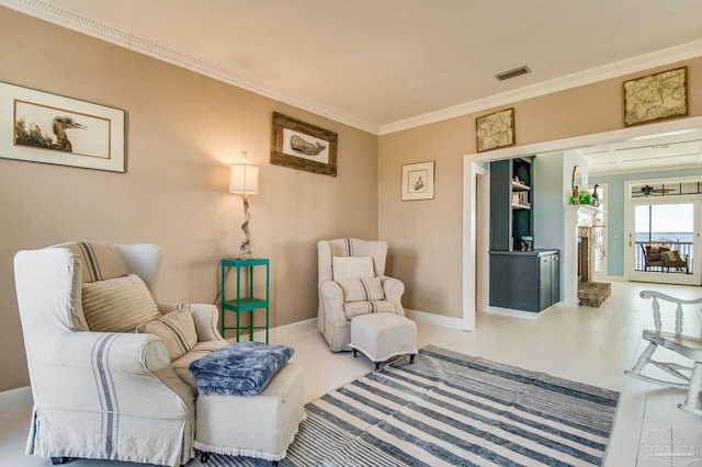 living area with crown molding