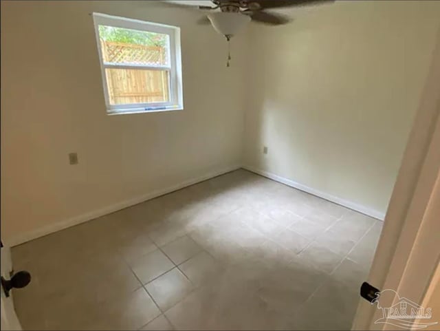 unfurnished room with ceiling fan