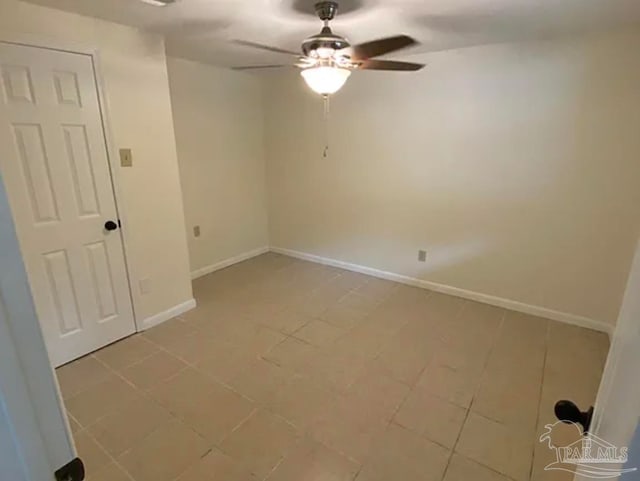 unfurnished room featuring ceiling fan