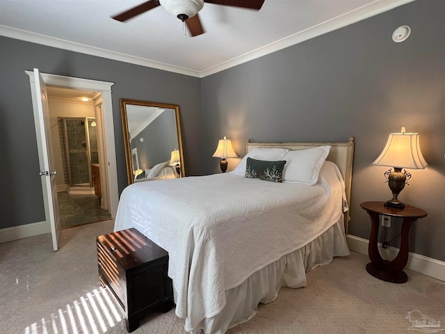 carpeted bedroom with ornamental molding and ceiling fan