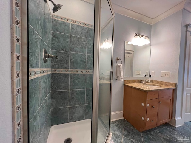 bathroom with vanity and a tile shower