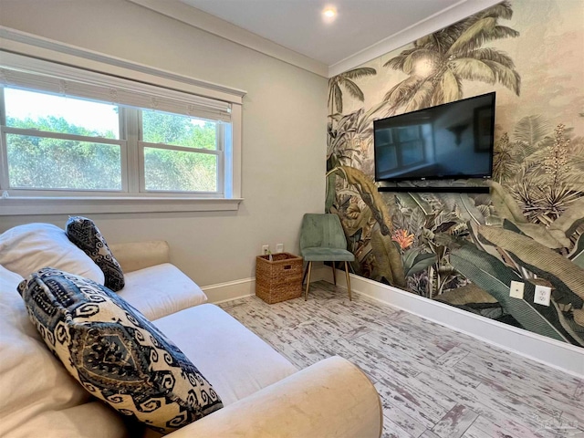 living room featuring ornamental molding and hardwood / wood-style flooring