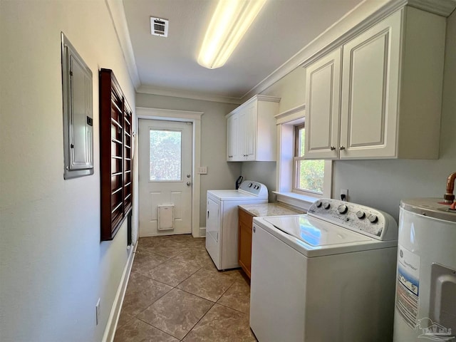 laundry area with cabinets, electric water heater, separate washer and dryer, ornamental molding, and plenty of natural light