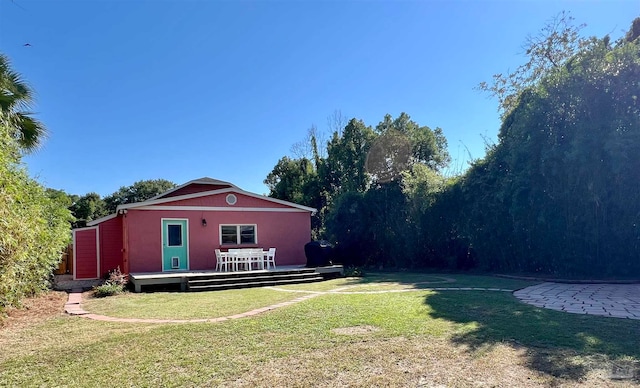 view of yard with a deck and a patio area