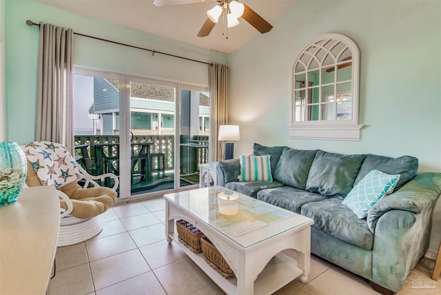 living room featuring light tile patterned flooring and ceiling fan