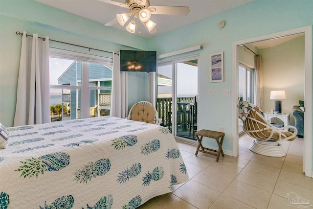 tiled bedroom with ceiling fan and access to exterior