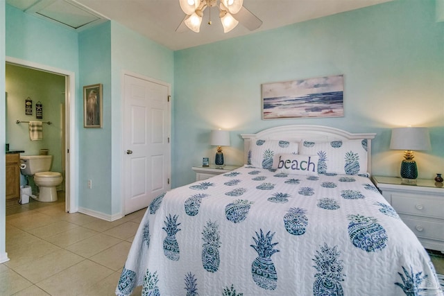 bedroom featuring ensuite bathroom, light tile patterned floors, and ceiling fan