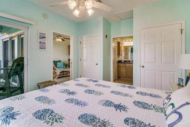 bedroom featuring ceiling fan, ensuite bathroom, and access to outside