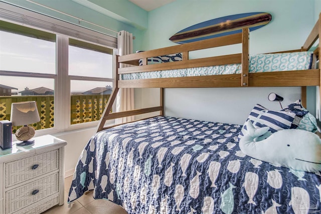 bedroom with light tile patterned flooring