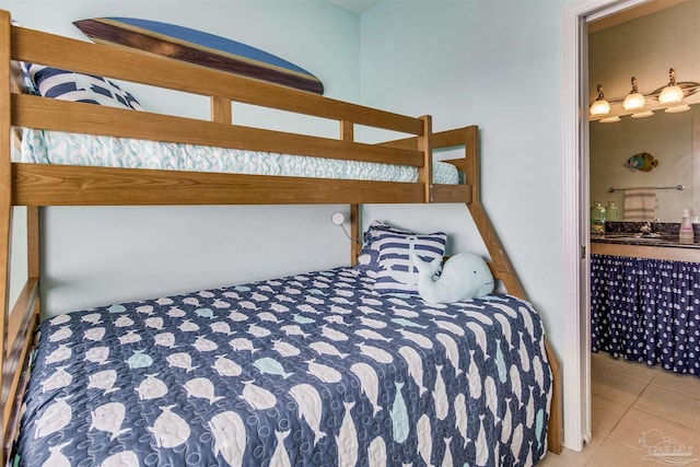 tiled bedroom with connected bathroom