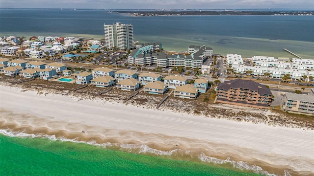 bird's eye view with a view of the beach and a water view