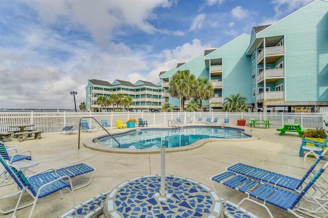 view of pool featuring a patio