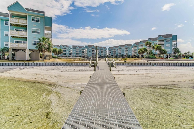 view of home's community with a water view