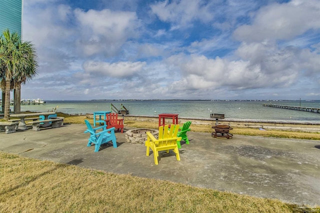 water view featuring an outdoor fire pit