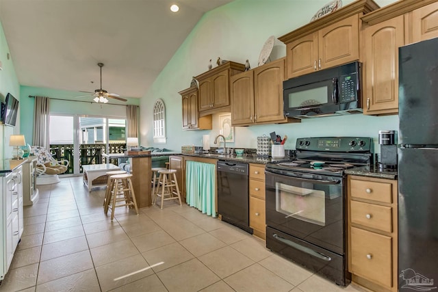 kitchen with light tile patterned flooring, sink, ceiling fan, and black appliances