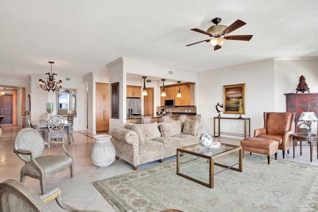 living area with ornamental molding, ceiling fan with notable chandelier, a textured ceiling, and light tile patterned floors