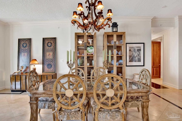 dining space with light tile patterned floors, a chandelier, and ornamental molding