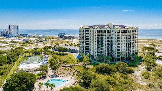 birds eye view of property with a water view