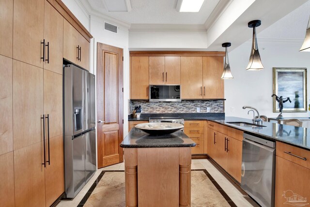 kitchen with decorative light fixtures, light tile patterned floors, tasteful backsplash, and stainless steel appliances