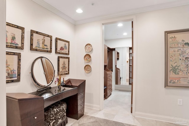 hallway featuring light tile patterned flooring, baseboards, crown molding, and recessed lighting