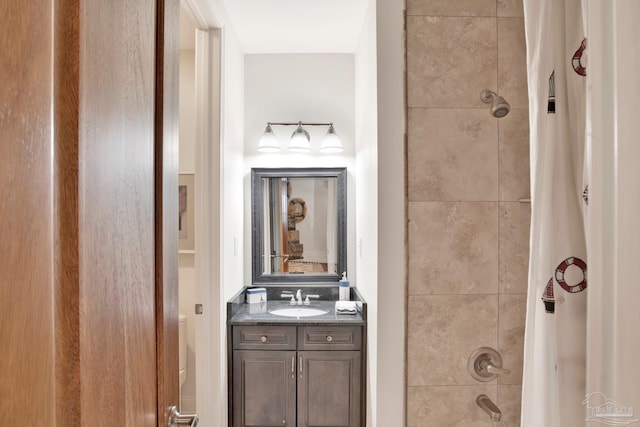 full bathroom with shower / tub combo with curtain and vanity