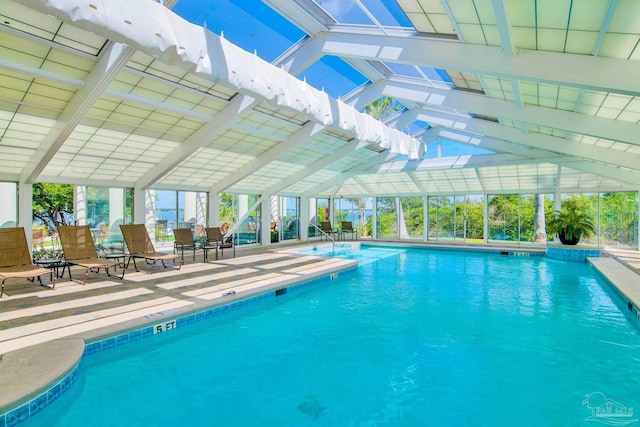 pool featuring a lanai and a patio