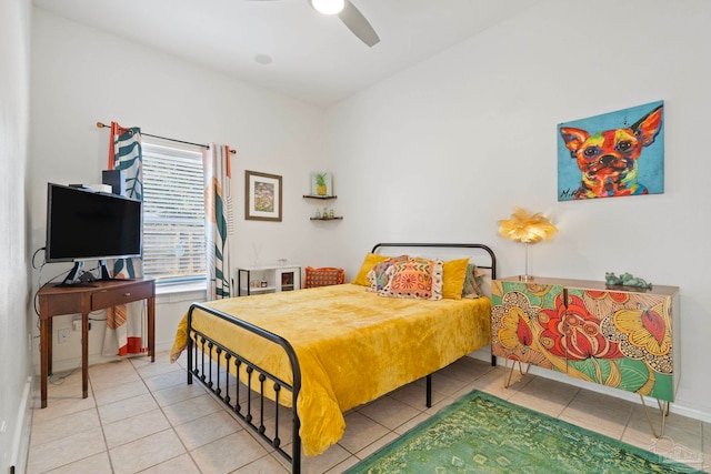 1669 Tidewater Ln, Navarre, FL 32566 - tiled bedroom featuring a ceiling fan and baseboards