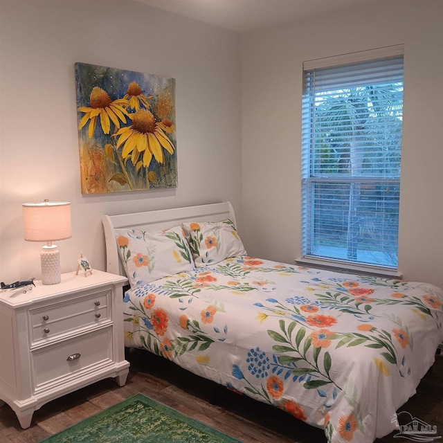 1669 Tidewater Ln, Navarre, FL 32566 - bedroom featuring wood finished floors