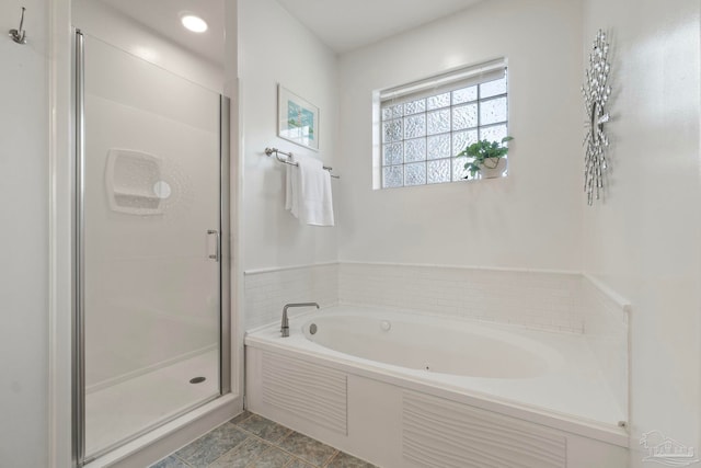 1669 Tidewater Ln, Navarre, FL 32566 - full bathroom with a shower stall, a bath, and tile patterned floors