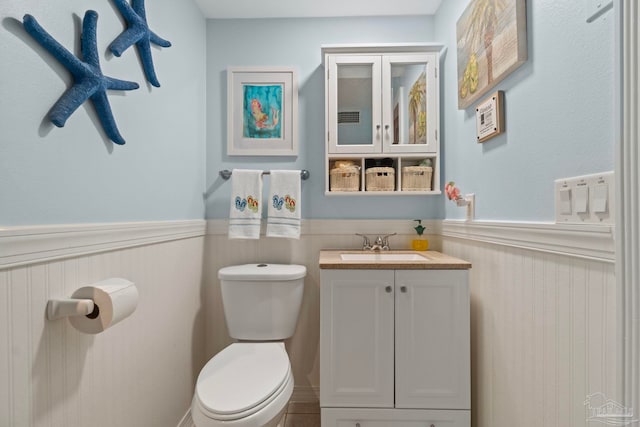 1669 Tidewater Ln, Navarre, FL 32566 - bathroom with wainscoting and vanity