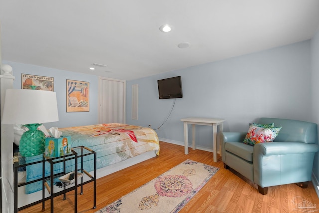 1669 Tidewater Ln, Navarre, FL 32566 - bedroom featuring wood finished floors and recessed lighting