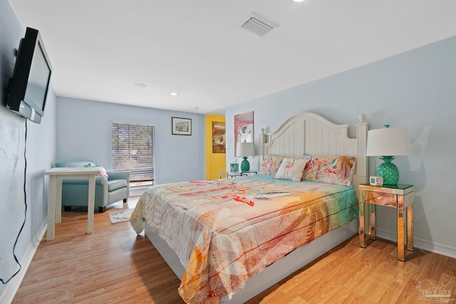 1669 Tidewater Ln, Navarre, FL 32566 - bedroom featuring light wood finished floors and recessed lighting
