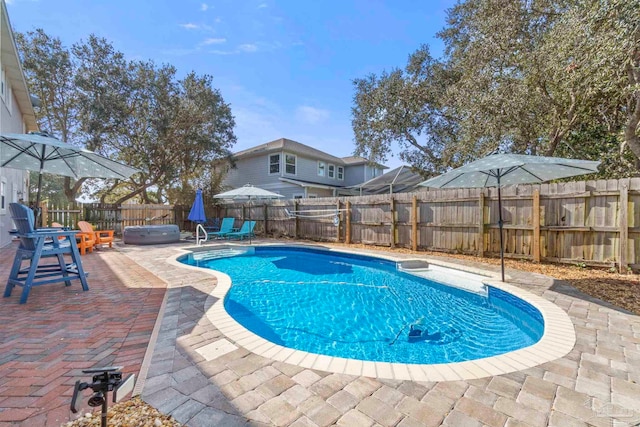 1669 Tidewater Ln, Navarre, FL 32566 - view of pool featuring a patio area, a jacuzzi, and a fenced backyard