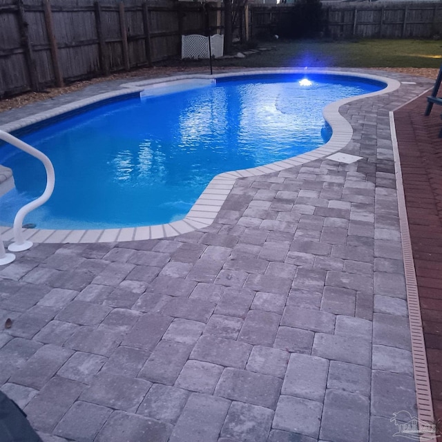 1669 Tidewater Ln, Navarre, FL 32566 - view of swimming pool with a fenced backyard and a patio area