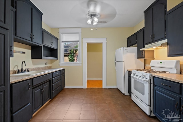506 E Scott St, Pensacola, FL 32503 - kitchen featuring a sink, light countertops, a ceiling fan, baseboards, and white range with gas stovetop
